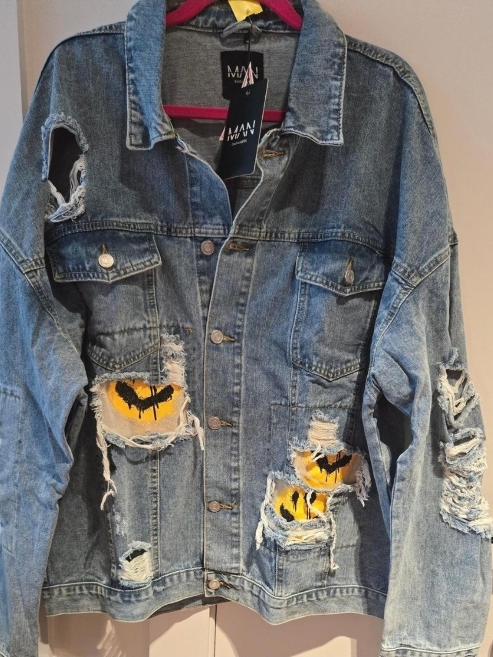 BoohooMAN Vintage Blue Distressed Denim Jacket with Yellow Patch Accents
